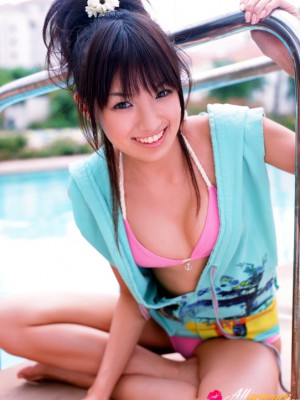 Akina Minami Oriental in colorful tub suits plays with huge ball